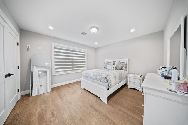 1427 Bellmore Rd, North Bellmore, NY 11710 - bedroom with light wood-style floors, baseboards, and recessed lighting