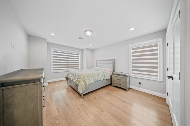 1427 Bellmore Rd, North Bellmore, NY 11710 - bedroom with baseboards, light wood-style flooring, and recessed lighting