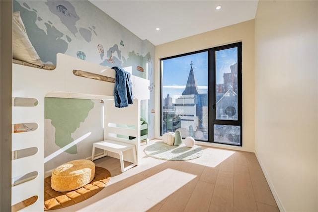 3116 21st St Unit Ph2B, Astoria, NY 11106 - bathroom featuring wood finished floors, baseboards, and recessed lighting