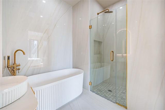 3116 21st St Unit Ph2B, Astoria, NY 11106 - full bath with a marble finish shower and a freestanding tub