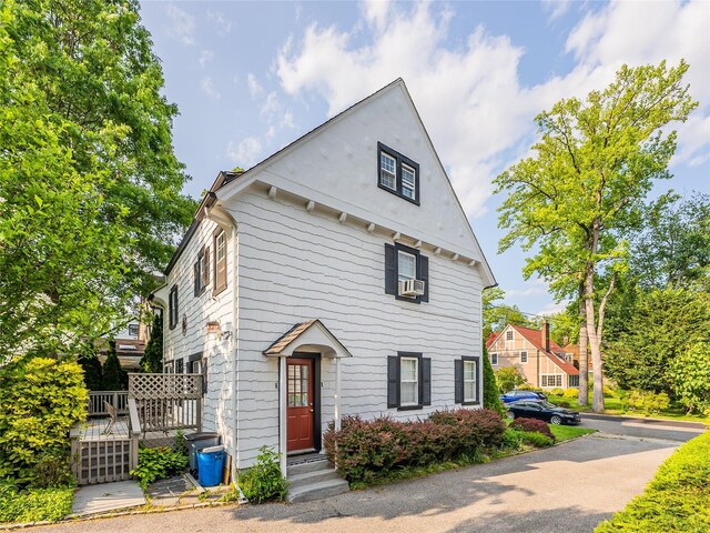 5 Cary Rd, Great Neck, NY 11021 - view of front of property with a wooden deck