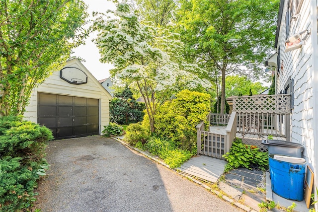 5 Cary Rd, Great Neck, NY 11021 - detached garage featuring driveway