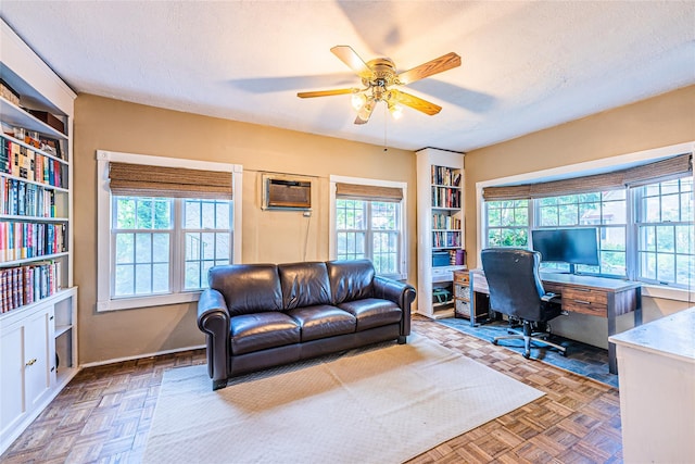 5 Cary Rd, Great Neck, NY 11021 - office featuring a ceiling fan, healthy amount of natural light, a textured ceiling, and baseboards