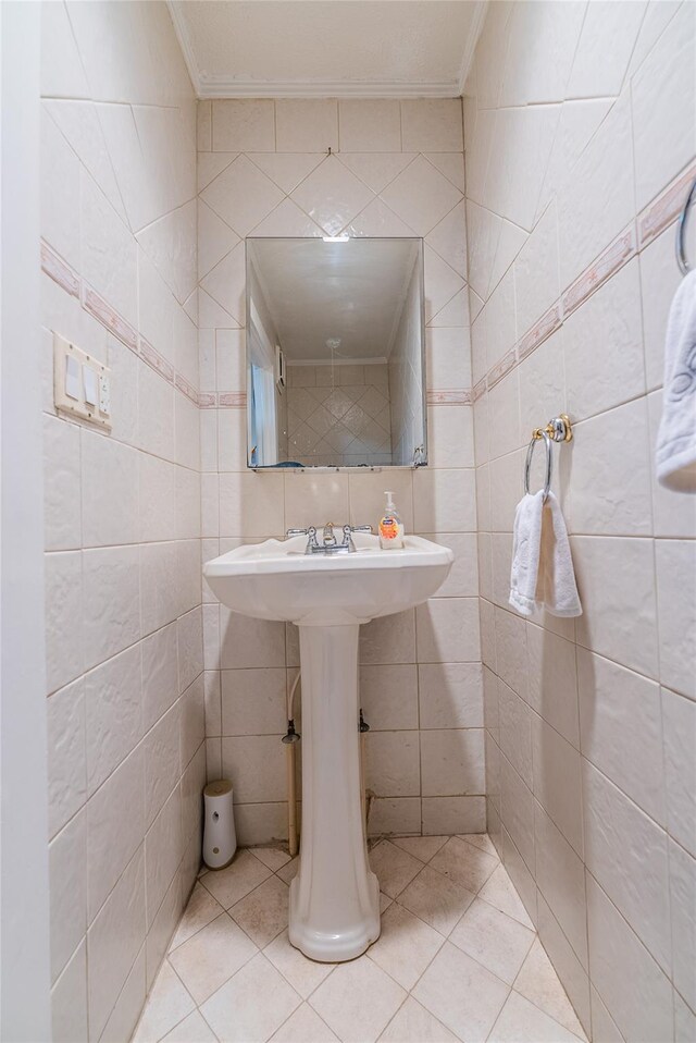 5 Cary Rd, Great Neck, NY 11021 - bathroom featuring ornamental molding, tile walls, and tile patterned floors