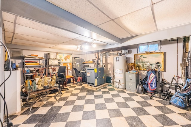 5 Cary Rd, Great Neck, NY 11021 - basement with water heater, a heating unit, a paneled ceiling, and tile patterned floors