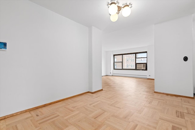 21-50 33rd Rd Unit 12Ab, Astoria, NY 11106 - unfurnished room with baseboards, a baseboard radiator, and a chandelier