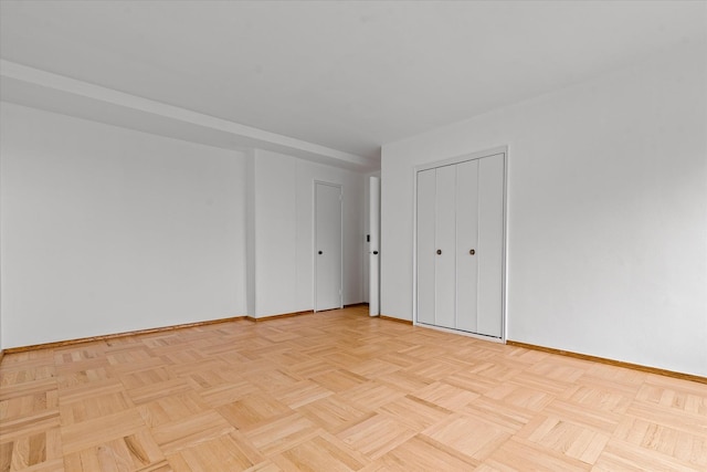 21-50 33rd Rd Unit 12Ab, Astoria, NY 11106 - unfurnished bedroom featuring baseboards