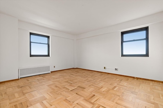 21-50 33rd Rd Unit 12Ab, Astoria, NY 11106 - unfurnished room with radiator and baseboards