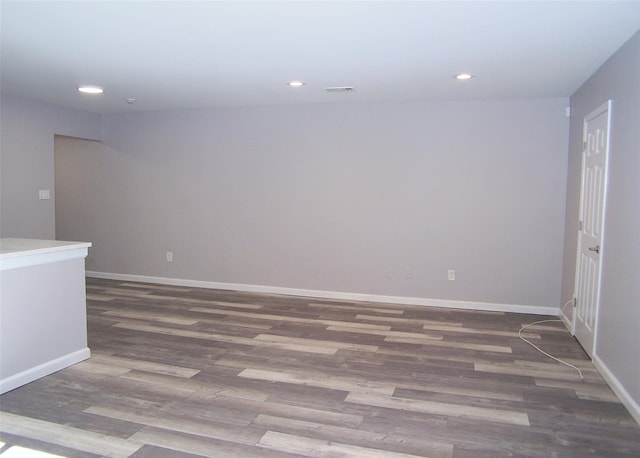 7 Laramie Ct Unit 7, Coram, NY 11727 - spare room featuring wood finished floors, recessed lighting, and baseboards