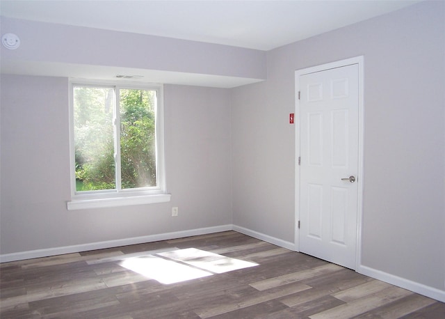 7 Laramie Ct Unit 7, Coram, NY 11727 - spare room with wood finished floors and baseboards