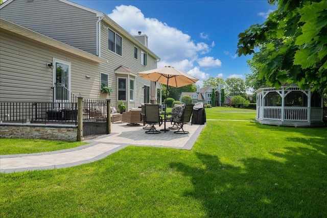 2 Moor Ln, East Patchogue, NY 11772 - view of grassy yard featuring a patio area