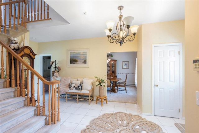 2 Moor Ln, East Patchogue, NY 11772 - entrance foyer with stairs, a chandelier, light tile patterned floors, and light colored carpet