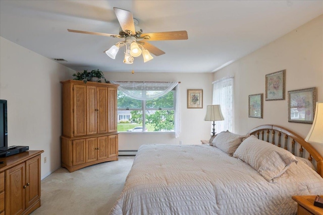 2 Moor Ln, East Patchogue, NY 11772 - bedroom featuring light colored carpet, multiple windows, a ceiling fan, and baseboard heating