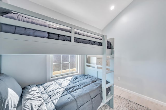 68 Brookline Ave, East Atlantic Beach, NY 11561 - bedroom featuring wood finished floors, lofted ceiling, baseboards, and recessed lighting
