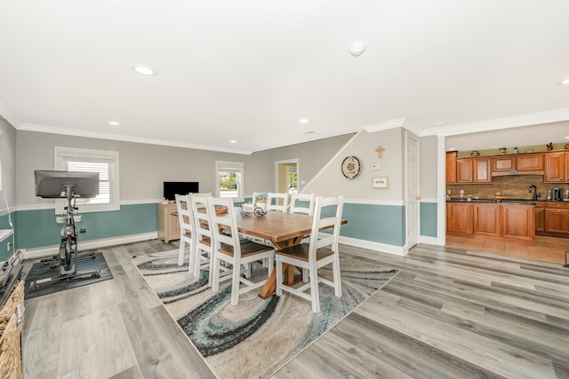 1450 Tadmor St, Merrick, NY 11566 - dining room featuring baseboards, light wood-type flooring, recessed lighting, and ornamental molding