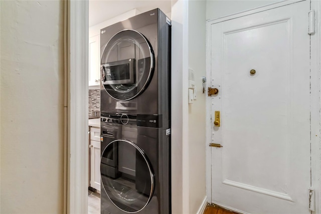 22-39 78th St Unit 2F, East Elmhurst, NY 11370 - laundry area with stacked washing machine and dryer