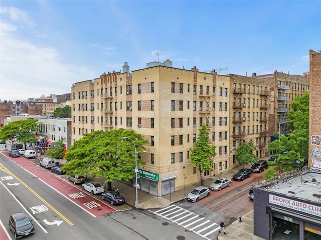 398 Oliver Pl Unit 1A, Bronx, NY 10458 - view of apartment building / complex with uncovered parking and a city view