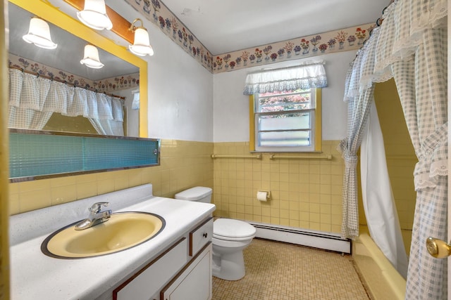 34 Leeside Dr, Carmel, NY 10512 - bathroom featuring a baseboard heating unit, toilet, vanity, tile walls, and tile patterned floors