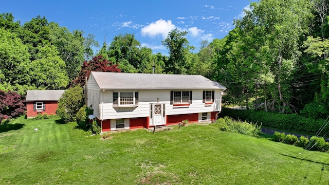 34 Leeside Dr, Carmel, NY 10512 - bi-level home featuring a front yard and a forest view
