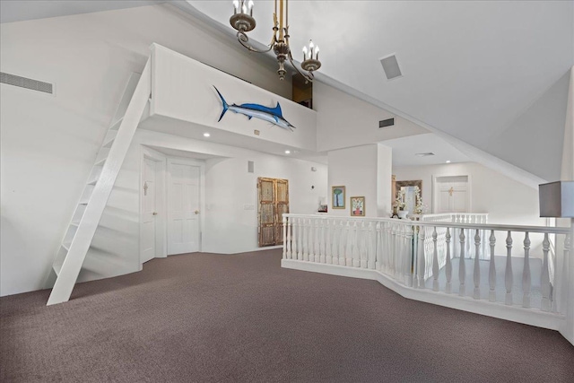 10 Bulaire, East Rockaway, NY 11518 - carpeted spare room featuring high vaulted ceiling and recessed lighting