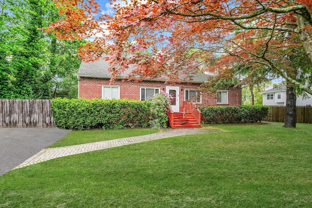 1817 Lincoln Ave, Holbrook, NY 11741 - view of front of home featuring brick siding and a shingled roof