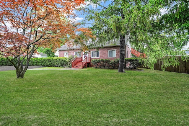 1817 Lincoln Ave, Holbrook, NY 11741 - view of front of home with a front yard and brick siding