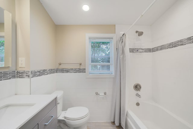 1817 Lincoln Ave, Holbrook, NY 11741 - full bath featuring vanity, tile walls, shower / bath combination with curtain, and wainscoting