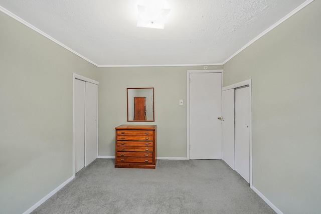1817 Lincoln Ave, Holbrook, NY 11741 - unfurnished bedroom with crown molding and carpet floors