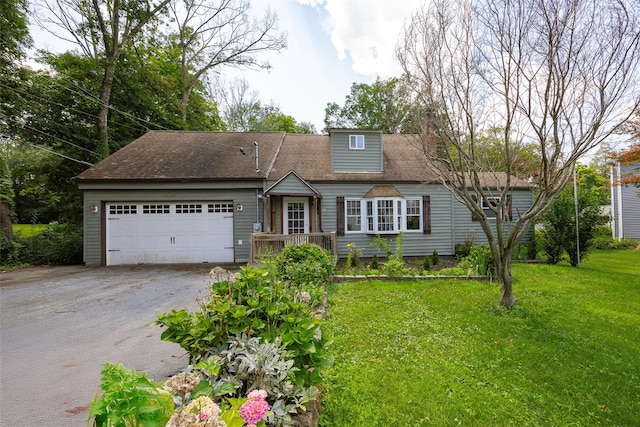 13 Cedar Ln, Poughkeepsie, NY 12601 - view of front of property featuring driveway, an attached garage, a front lawn, and a chimney