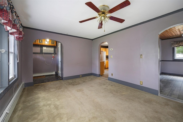 13 Cedar Ln, Poughkeepsie, NY 12601 - unfurnished room with a baseboard radiator, arched walkways, ceiling fan, carpet flooring, and crown molding