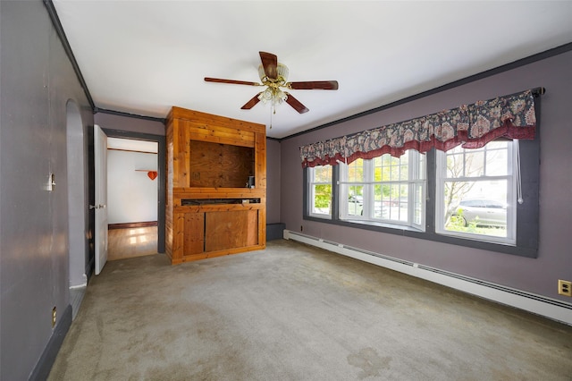 13 Cedar Ln, Poughkeepsie, NY 12601 - unfurnished living room with a baseboard heating unit, ceiling fan, and carpet flooring