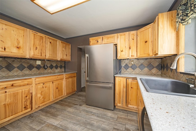 13 Cedar Ln, Poughkeepsie, NY 12601 - kitchen featuring freestanding refrigerator, light wood finished floors, light countertops, and tasteful backsplash