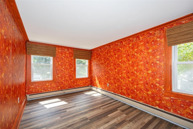 13 Cedar Ln, Poughkeepsie, NY 12601 - unfurnished room featuring a baseboard heating unit, wood finished floors, and crown molding