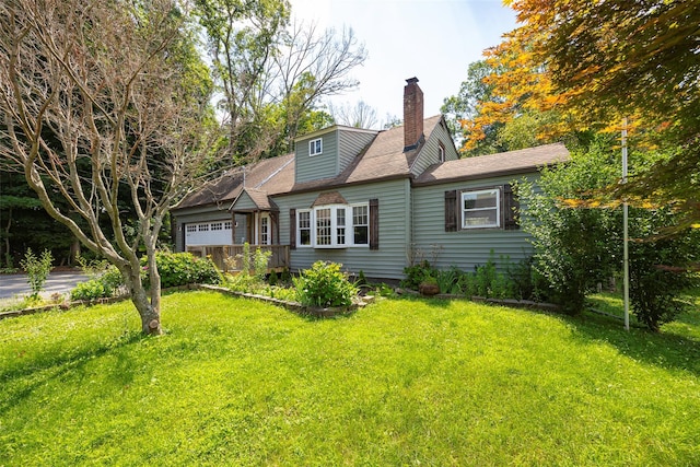 13 Cedar Ln, Poughkeepsie, NY 12601 - view of front of property with a garage, a front lawn, and a chimney