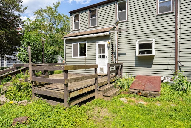 13 Cedar Ln, Poughkeepsie, NY 12601 - back of property with a deck and a yard