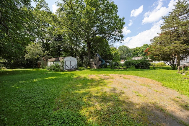 13 Cedar Ln, Poughkeepsie, NY 12601 - view of green lawn featuring a storage shed
