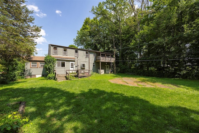 13 Cedar Ln, Poughkeepsie, NY 12601 - back of property with a wooden deck and a yard