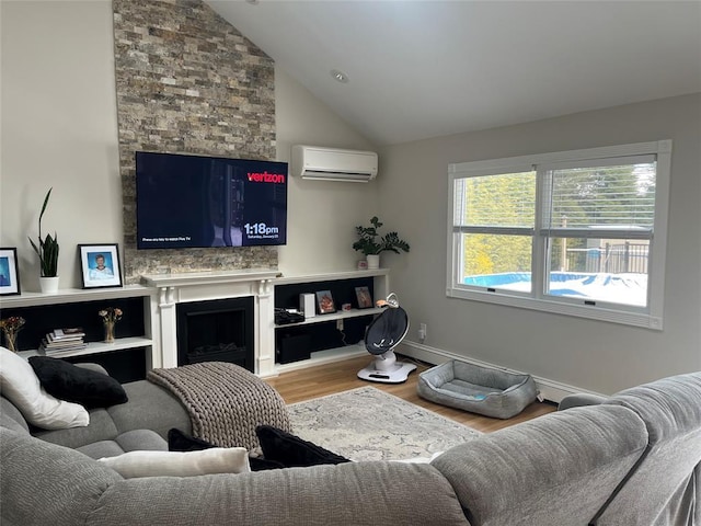 14 Cornfield Ln, Commack, NY 11725 - living room featuring an AC wall unit, a fireplace, wood finished floors, and lofted ceiling