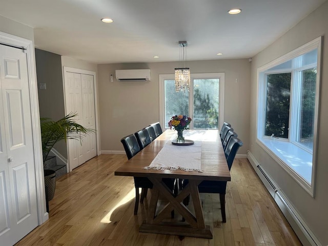 14 Cornfield Ln, Commack, NY 11725 - dining area featuring a baseboard heating unit, an AC wall unit, a chandelier, light wood-style floors, and recessed lighting