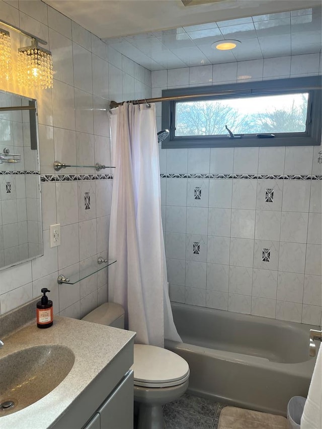 14 Cornfield Ln, Commack, NY 11725 - full bath featuring tile walls, shower / tub combo with curtain, vanity, tile patterned floors, and toilet