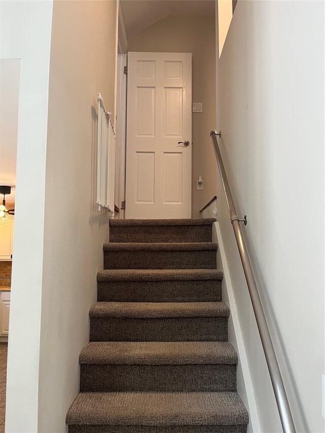 14 Cornfield Ln, Commack, NY 11725 - stairway with lofted ceiling