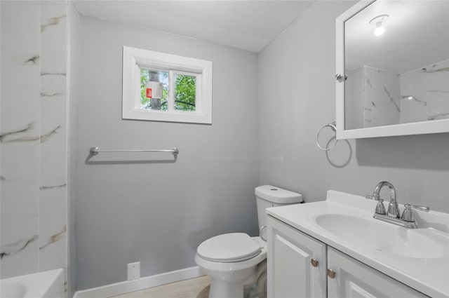 809 Broadway Unit 9W, Ulster Park, NY 12487 - full bathroom with vanity, toilet, and baseboards