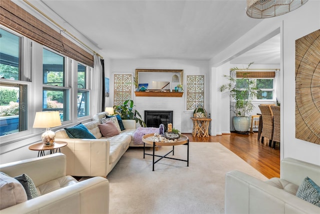 123 Maple Ave, Northport, NY 11768 - living area featuring wood finished floors and a glass covered fireplace