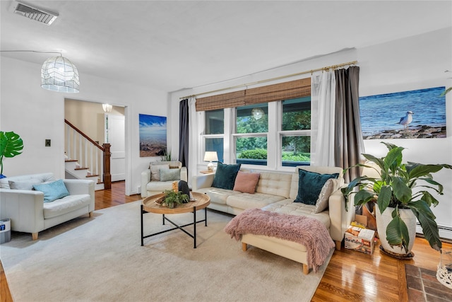 123 Maple Ave, Northport, NY 11768 - living area with wood finished floors and stairway