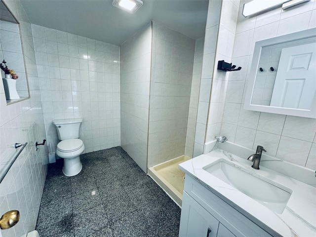 132-49 41st Rd Unit 2A, Flushing, NY 11355 - bathroom with tile walls, toilet, tiled shower, and vanity