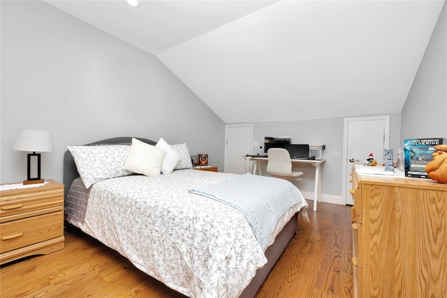 18 Hamilton St, Farmingdale, NY 11735 - bedroom with lofted ceiling, light wood finished floors, and an office area