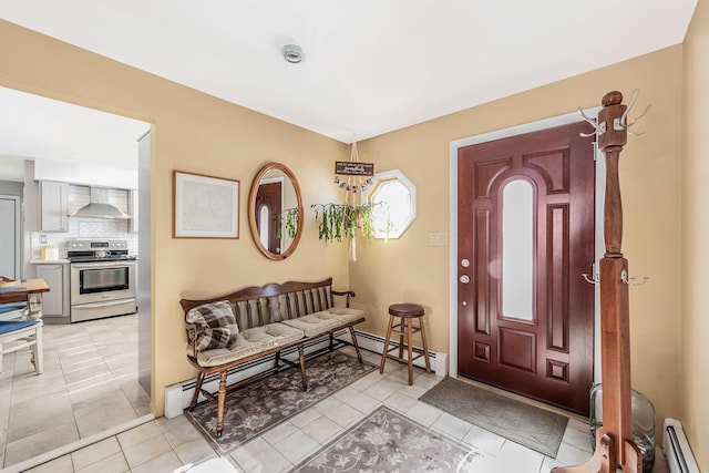51 Pewter Ln, Hicksville, NY 11801 - entrance foyer featuring a baseboard radiator and light tile patterned floors