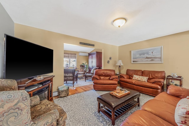 51 Pewter Ln, Hicksville, NY 11801 - living room with wood finished floors and a baseboard radiator