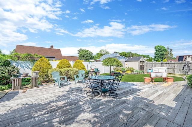 51 Pewter Ln, Hicksville, NY 11801 - wooden deck featuring a fenced backyard and outdoor dining space