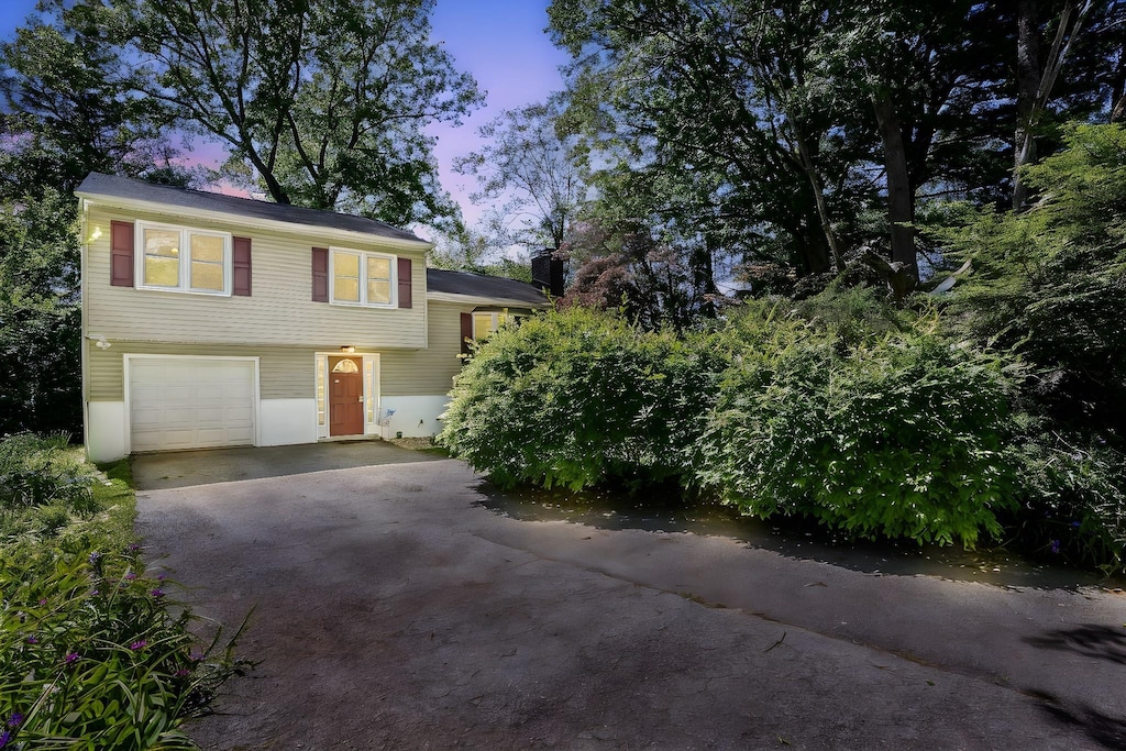 7 Adele Ct, Montrose, NY 10548 - tri-level home with driveway and an attached garage